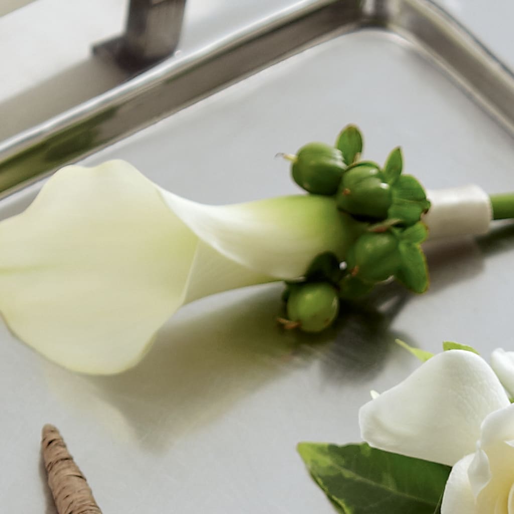 White Calla Boutonniere – ROY'S FLORIST, Winnipeg MB